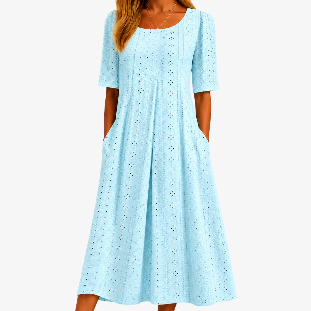 Women's sage eyelet midi dress with pockets, graceful botanical print. Perfect flowy summer casual elegant wear.