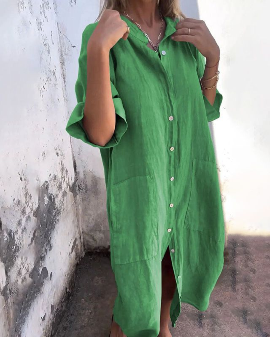 Back view of a comfortable women's shirt dress, featuring a relaxed fit and soft, breathable fabric for everyday wear.