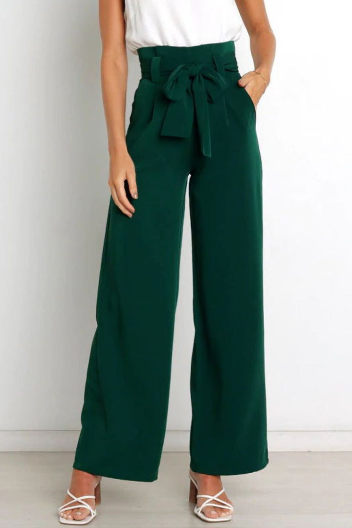 Elegant women's paperbag pants, high waist, wide leg, and a charming front bow.