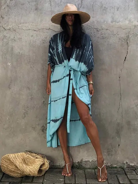 Stylish beach accessory: a women's flowy bohemian sarong cover-up.
