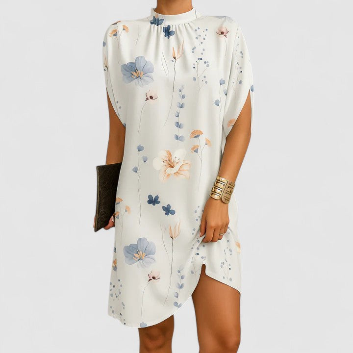 Versatile elegant summer dress for women, ideal for day events or chic evening wear. Flattering design.
