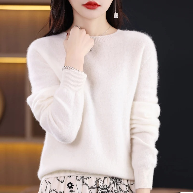 Elegant long sleeve round neck sweater for women, offering luxurious warmth and comfort.