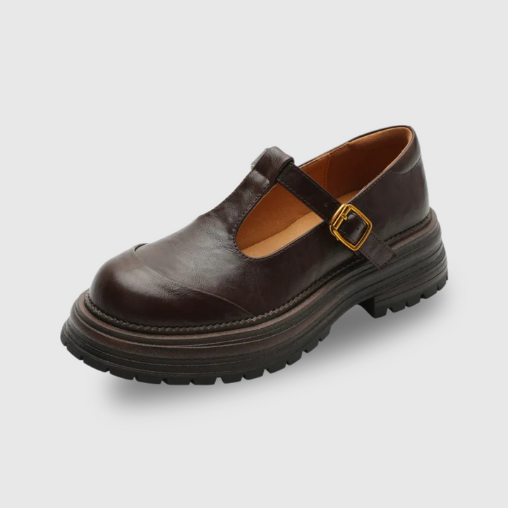 Supportive classic t-bar shoes for women, low heel, ideal for comfortable daily wear.