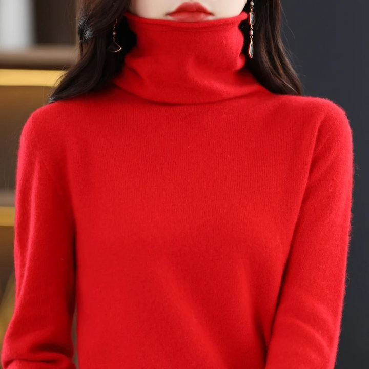 Elegant women's roll neck top. Soft long sleeve sweater, ideal for versatile styling.