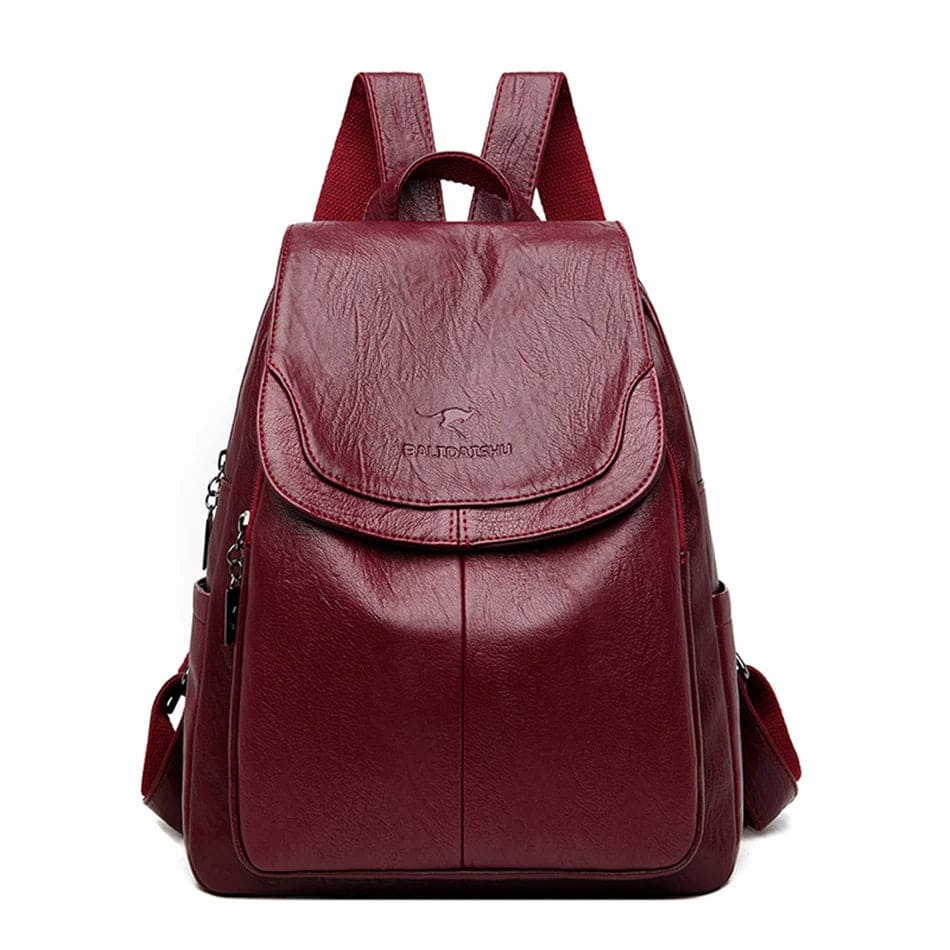 Elegant women's leather anti-theft daily carry backpack with multiple compartments for essentials.