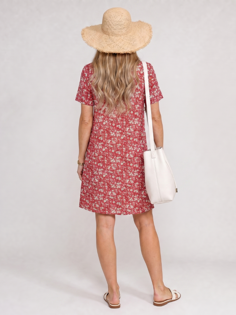 Comfortable women's short sleeve knee-length dress. Geometric print, ideal casual summer fashion. Easy to wear.