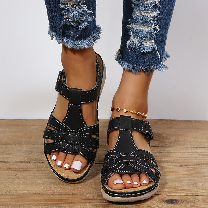 Stylish women's slip-on walking sandals, offering arch support & comfort. Ideal summer footwear for everyday and travel.