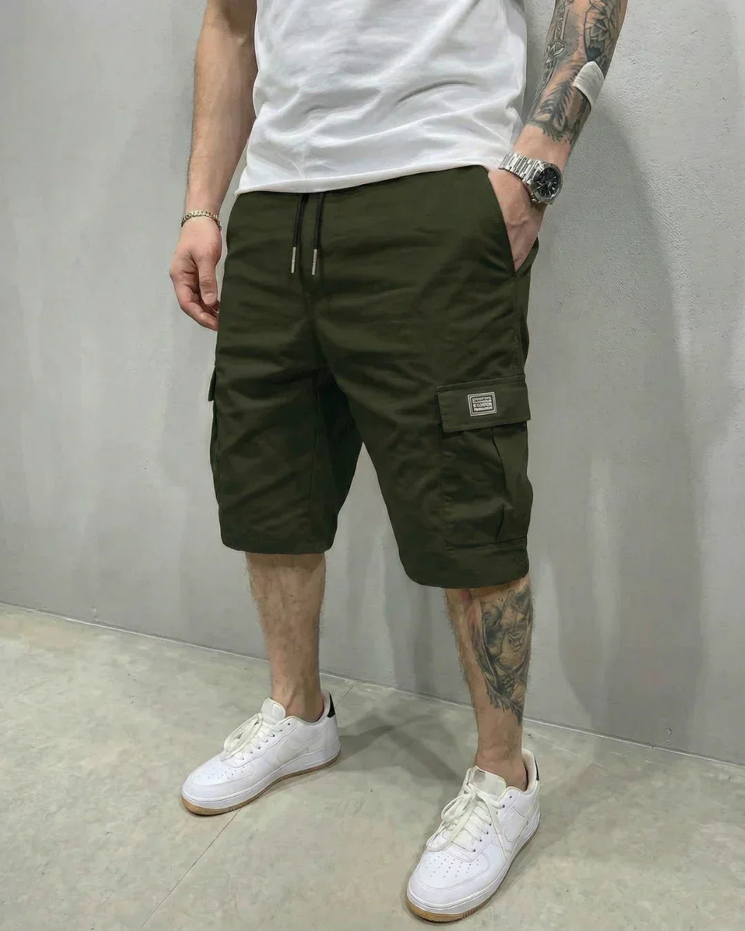 Comfortable men's utility shorts with adjustable drawstring waist & practical cargo pockets for relaxed, casual wear.