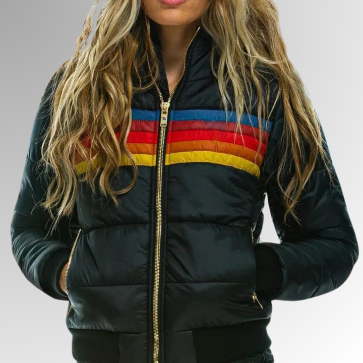 Stylish women's puffer jacket, quilted for warmth, with hood & zip pockets. Essential fall & winter outerwear.
