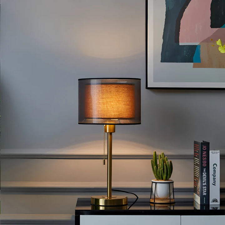 Chic vintage table lamp for home decor, featuring a double fabric shade & warm ambient LED light, perfect for bedrooms.
