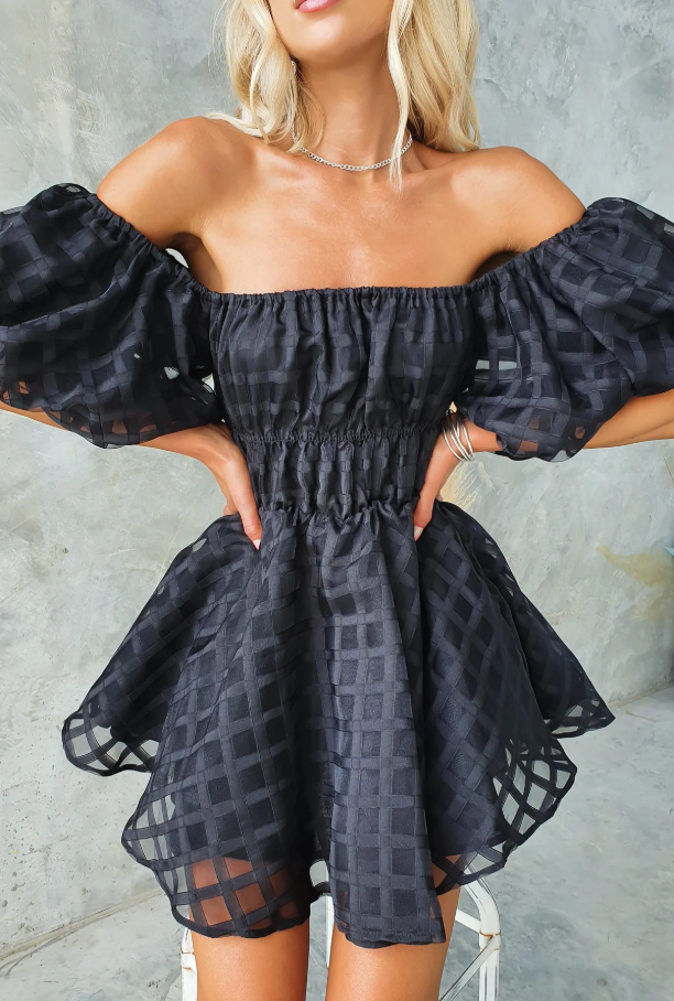 Fashionable mini dress for women, featuring elegant puff sleeves, great for wedding guests.