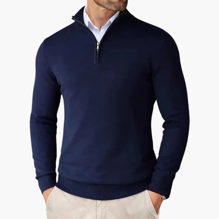 Men's quarter zip pullover, highlighting its comfortable fit & ribbed hem. A stylish long sleeve casual top.