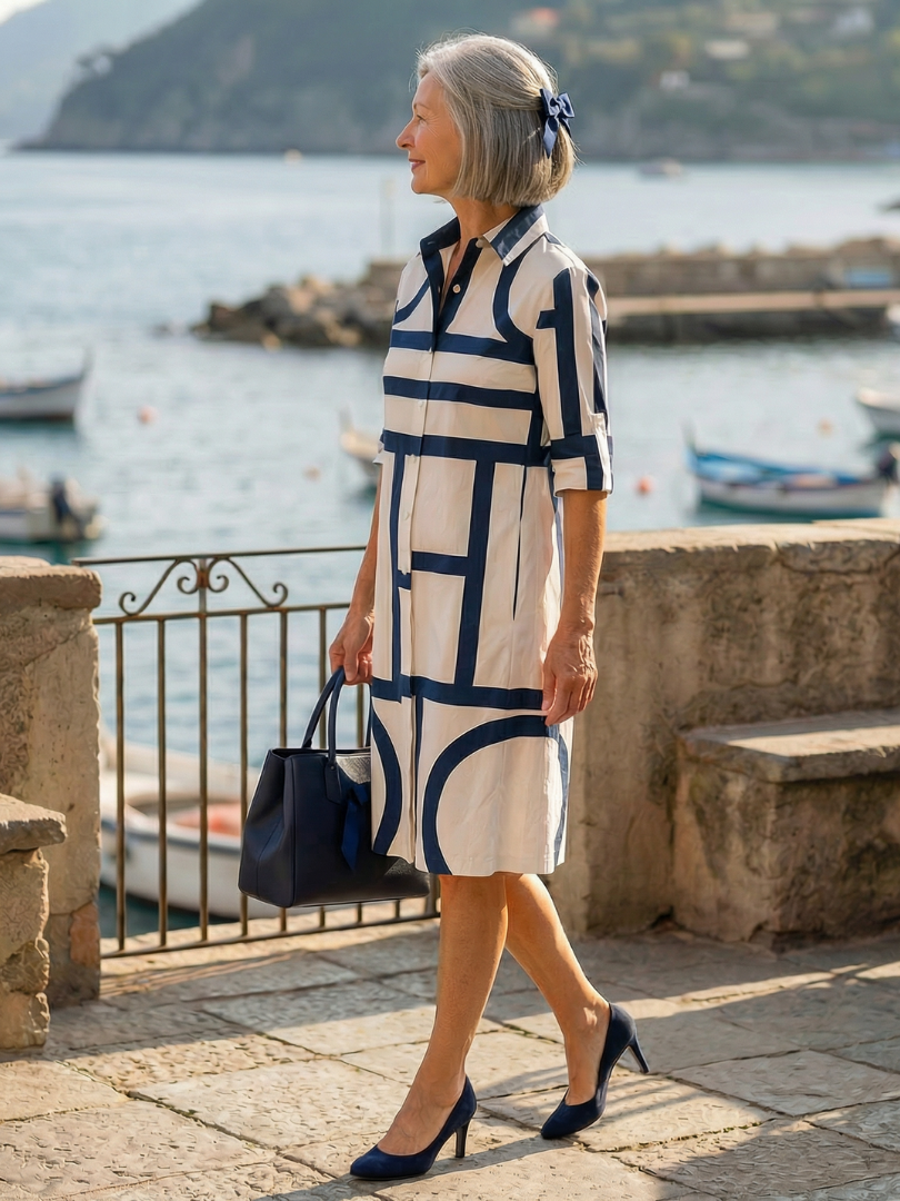 Versatile women's geometric pattern blue casual dress, knee-length, three-quarter sleeve with stylish button front.