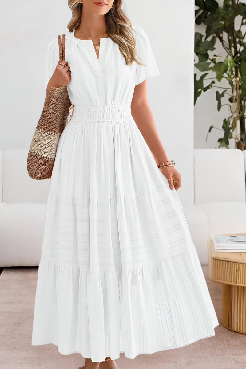 Bohemian style women's smocked midi dress, short sleeve, versatile and chic for summer outfits.