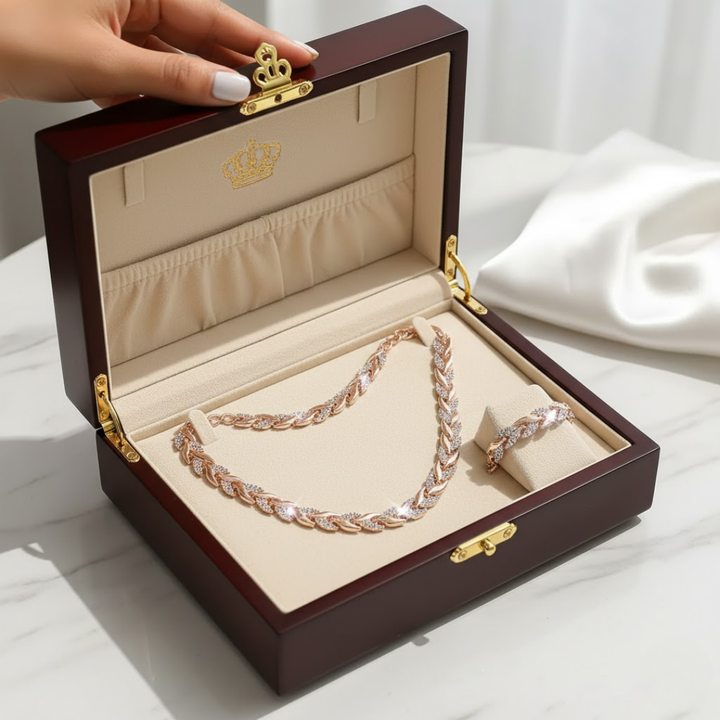 Close-up of the dazzling rhinestone fish tail pendant and matching bracelet from the elegant women's jewelry set.