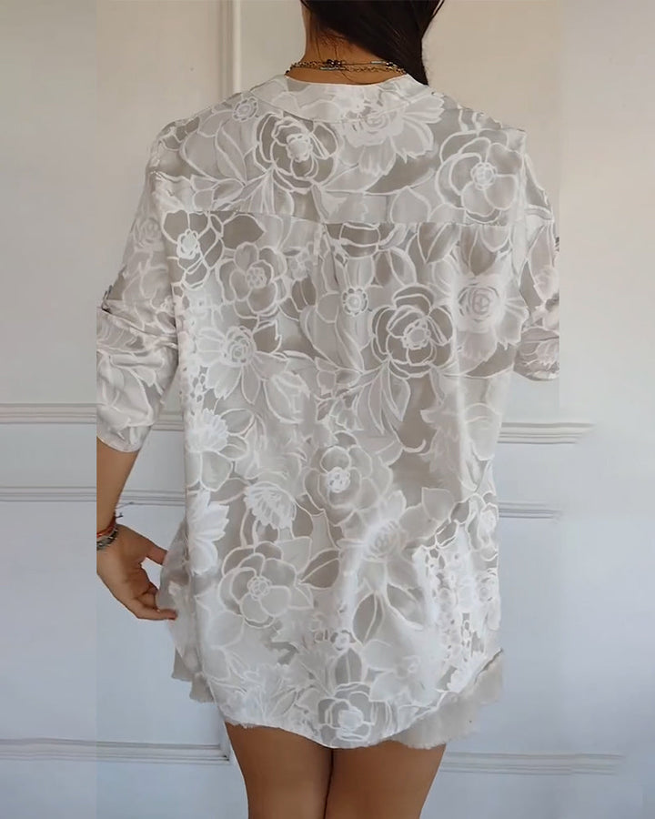 Relaxed fit women's blouse featuring a vibrant floral print, ideal for casual chic style.
