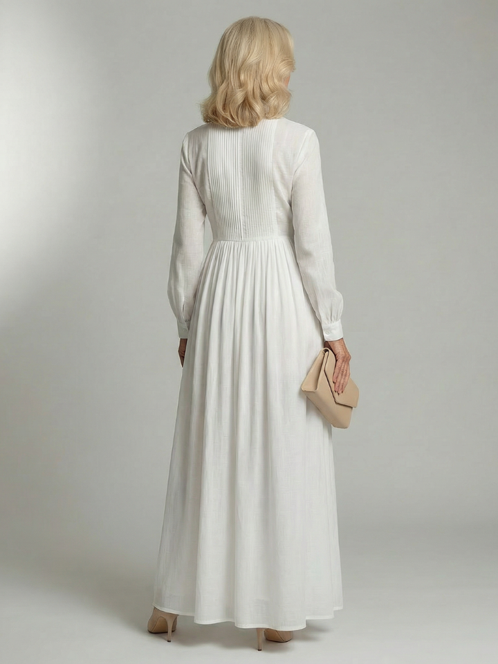 Casual long sleeve white maxi dress for women, a comfortable flowy spring fashion essential with button front.