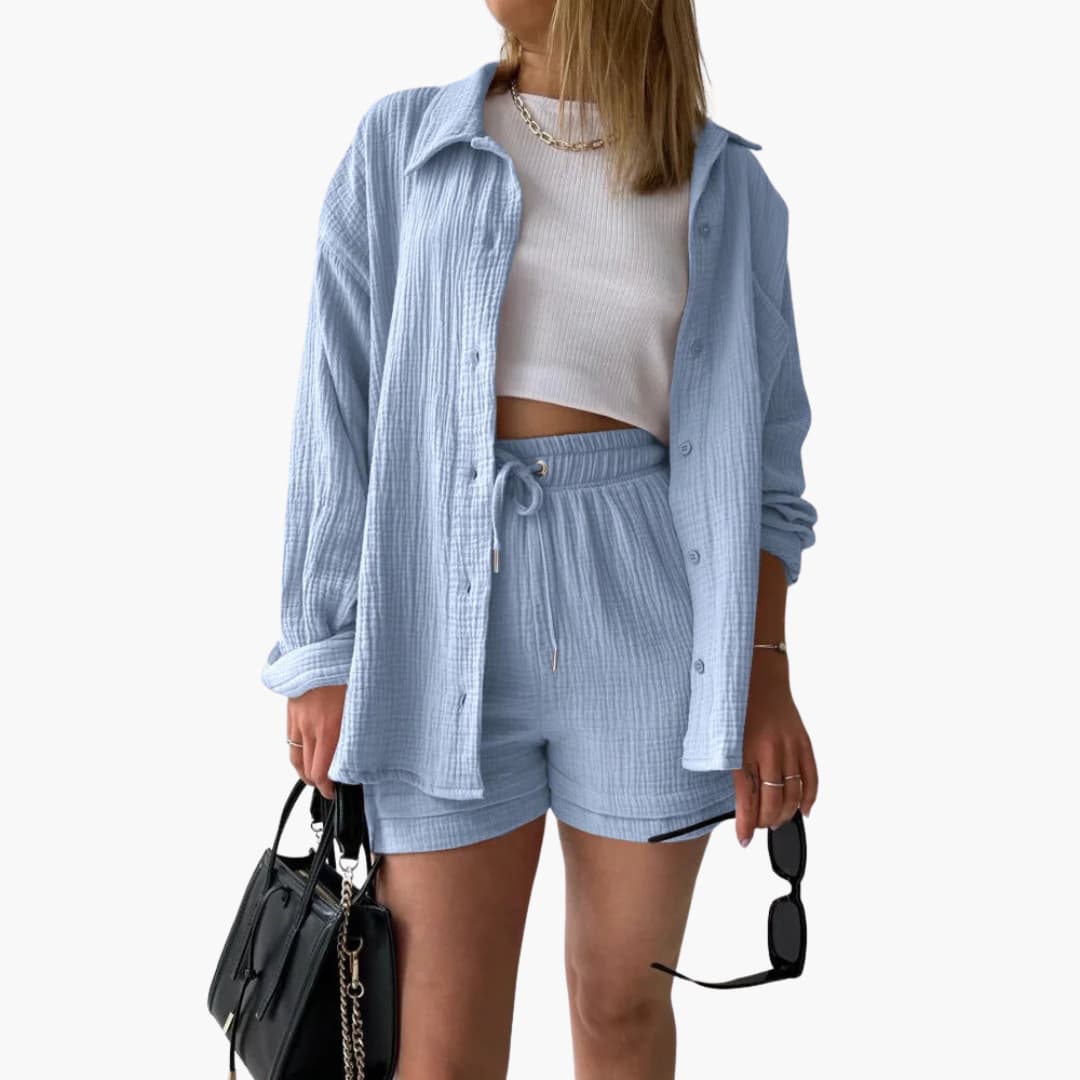 Loose-fit women's three-piece matching set: casual shirt, fitted crop top & comfortable high-waist shorts.
