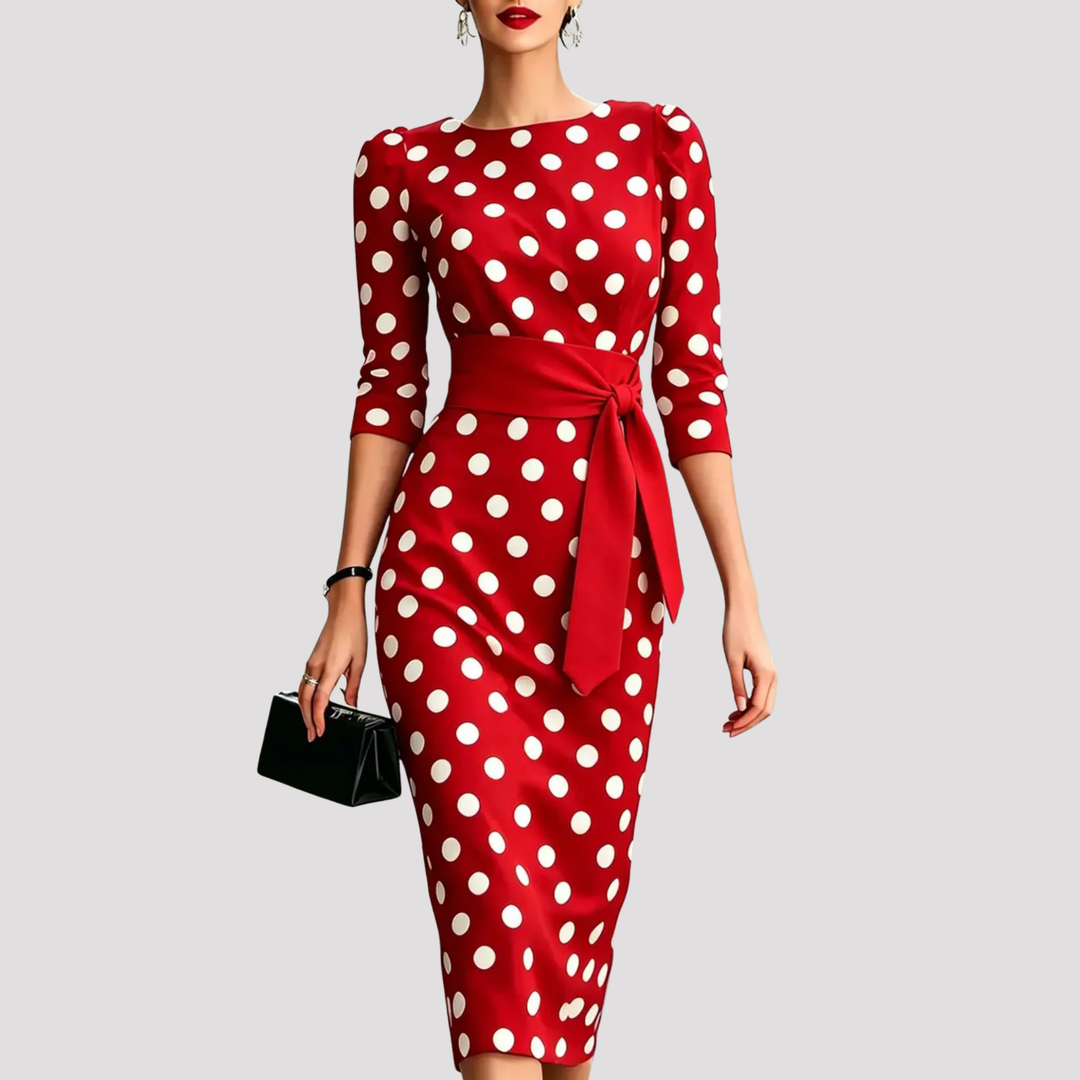 Stylish women's belted polka dot midi dress, offering a flattering silhouette and classic design for elegant fashion.