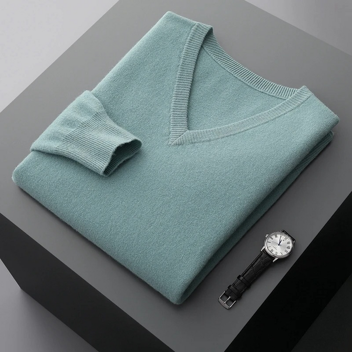 Versatile men's V-neck knit sweater, perfect for casual or dressed-up looks. All-season comfort.