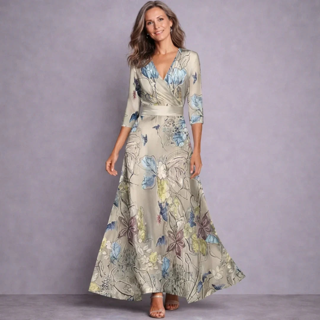 Flowy women's floral maxi dress with mid-sleeves, offering comfortable and versatile chic for any season.
