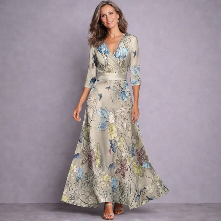 Flowy women's floral maxi dress with mid-sleeves, offering comfortable and versatile chic for any season.