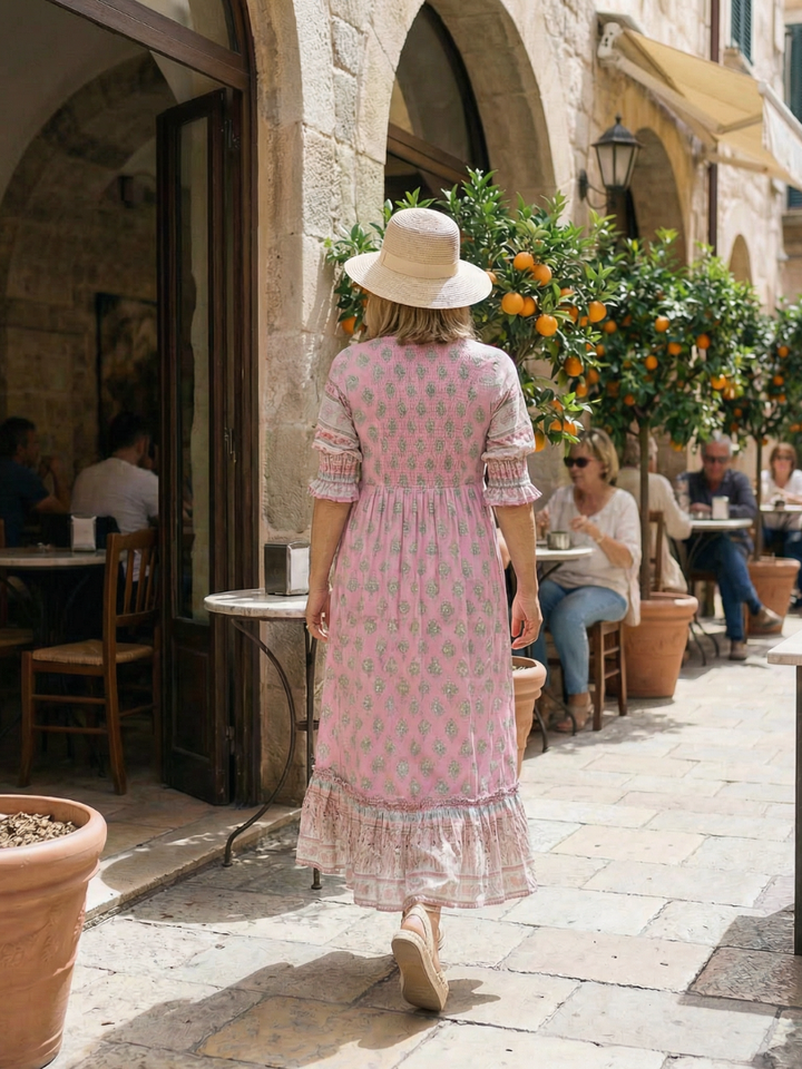 Casual women's floral midi dress featuring a stylish V-neck. Perfect for relaxed fit summer and spring fashion.