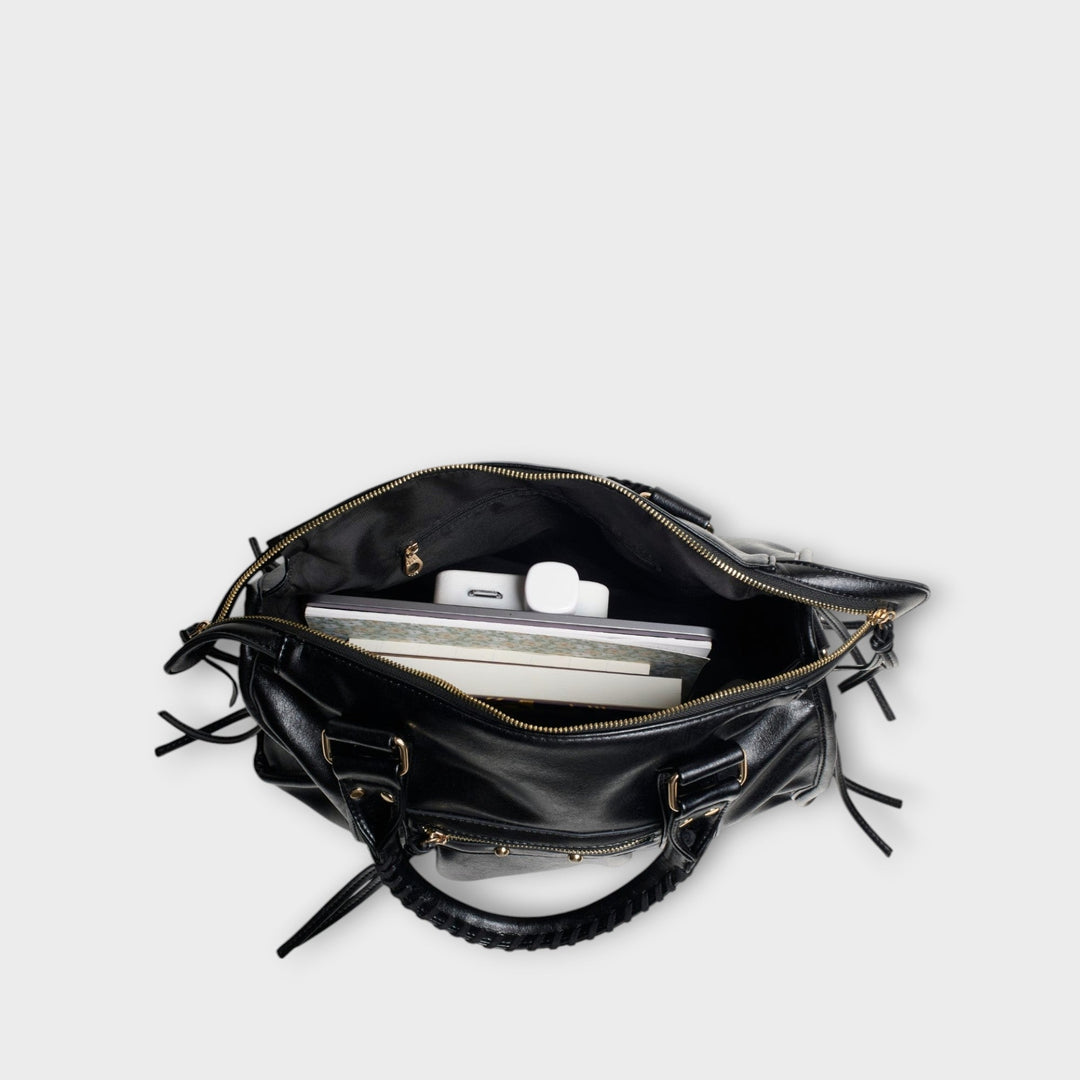 Black vegan leather women's laptop tote bag, designed for daily elegance as a shoulder or crossbody.