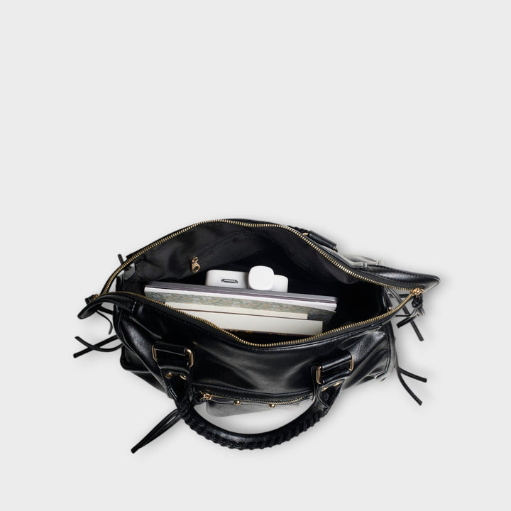 Black vegan leather women's laptop tote bag, designed for daily elegance as a shoulder or crossbody.