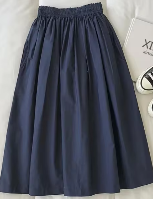 Stylish single-breasted women's midi skirt, high-waist design offering elegant & casual chic versatility.