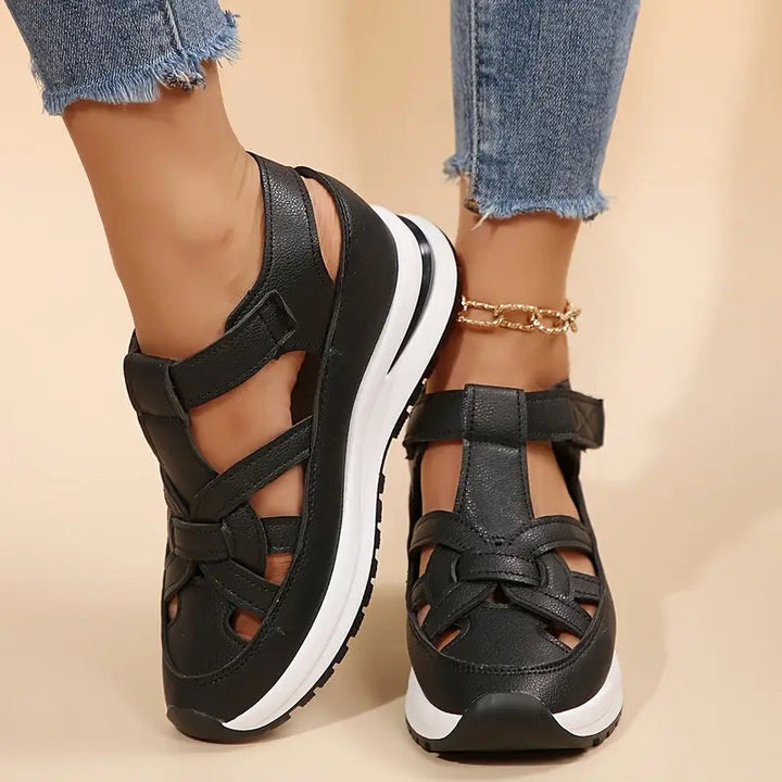 Comfortable women's walking sandals featuring orthopaedic design & cushioned arch support for foot health.