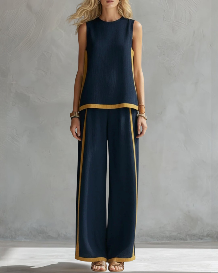 Complete women's elegant outfit: sleeveless top & comfortable wide leg trouser set. Casual chic for summer.
