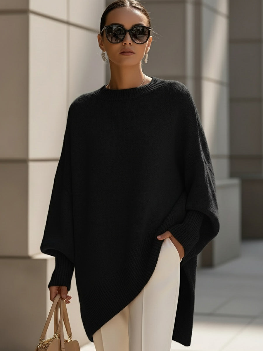 Cozy oversized long sleeve sweater for women, featuring a relaxed fit & modern design for winter fashion.
