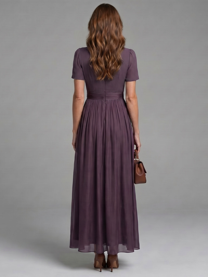 Purple women's gathered waist maxi dress with stylish keyhole detail, offering an elegant & comfortable fit.