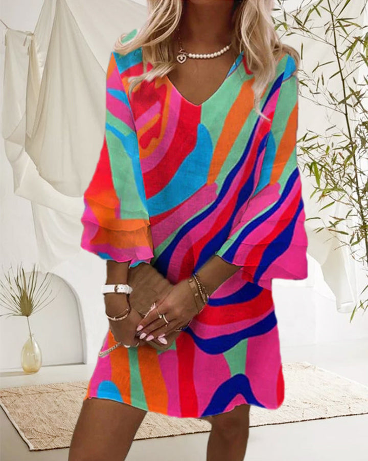 Fashionable A-line mini dress with a V-neck and dramatic bell sleeves for a glamorous evening look.