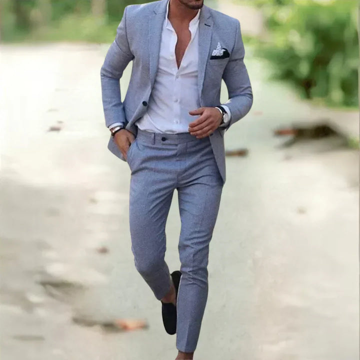 Woman in a sophisticated two-piece business suit set. Elegant blazer & pants for modern office fashion.