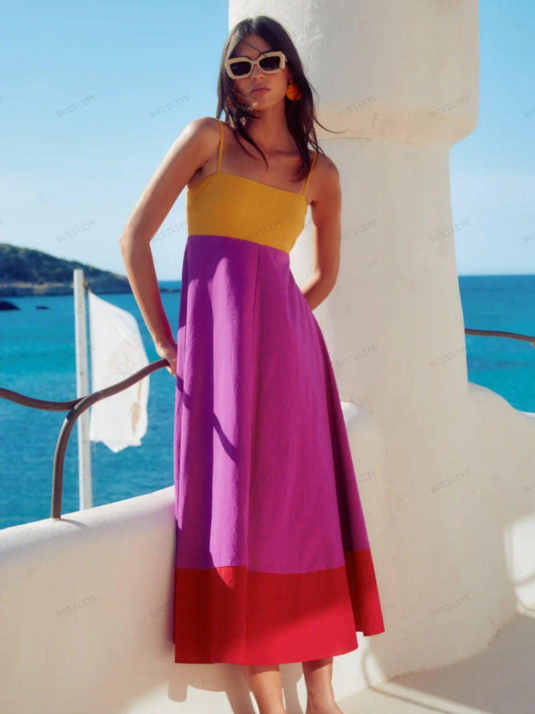 Elegant women's sleeveless color block midi dress with spaghetti straps, ideal for chic summer fashion & comfort.