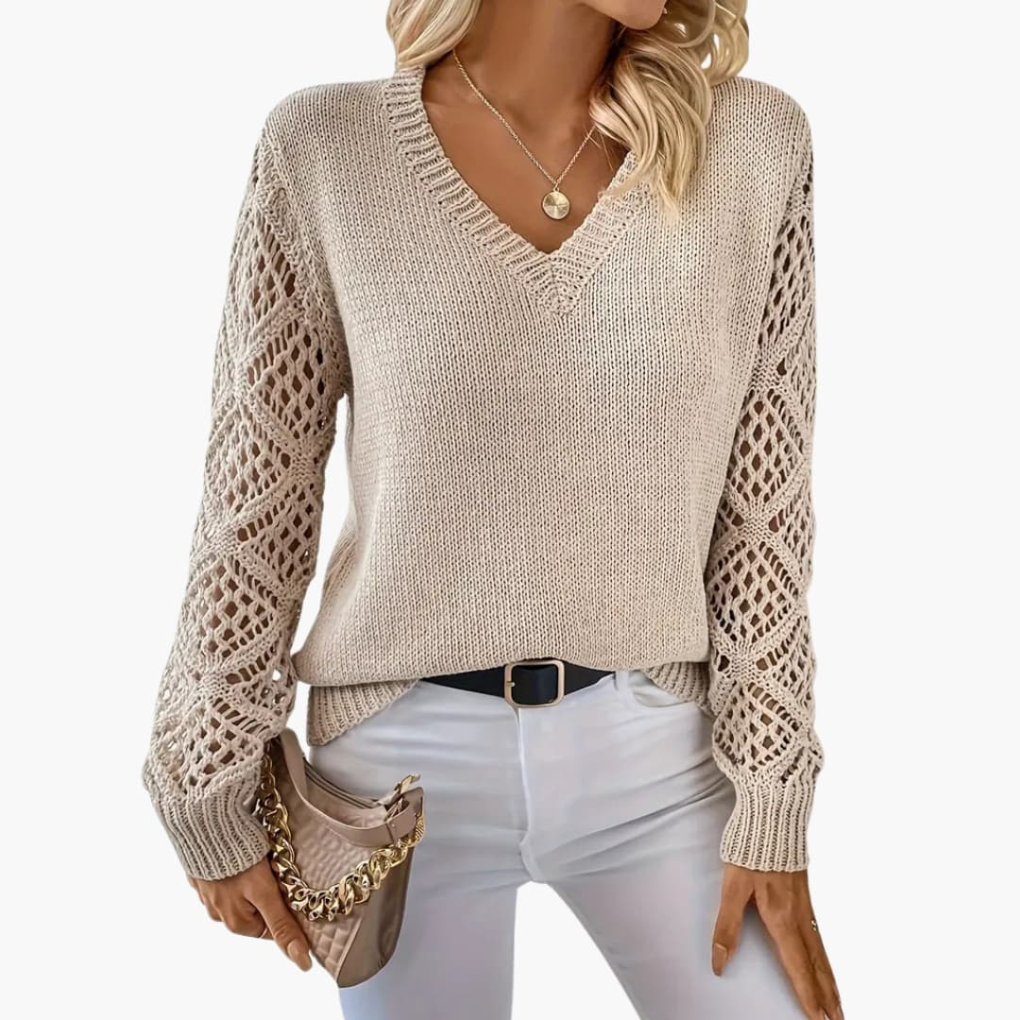 Elegant women's V-neck pullover, knitted with chic open sleeve detail for a stylish look. Great for spring.