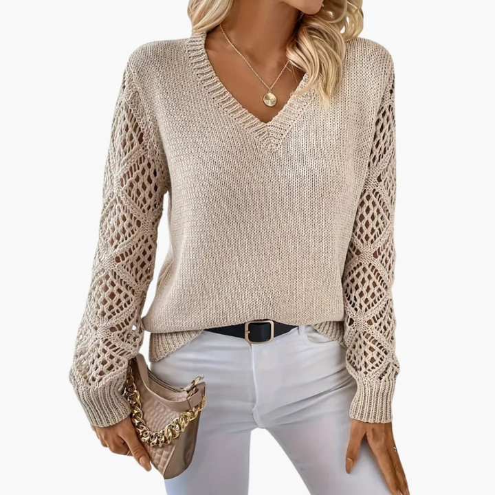 Elegant women's V-neck pullover, knitted with chic open sleeve detail for a stylish look. Great for spring.