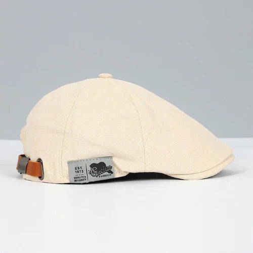 Fashionable men's buckle cap, a timeless ivy cap style perfect for smart casual wear and accessories.