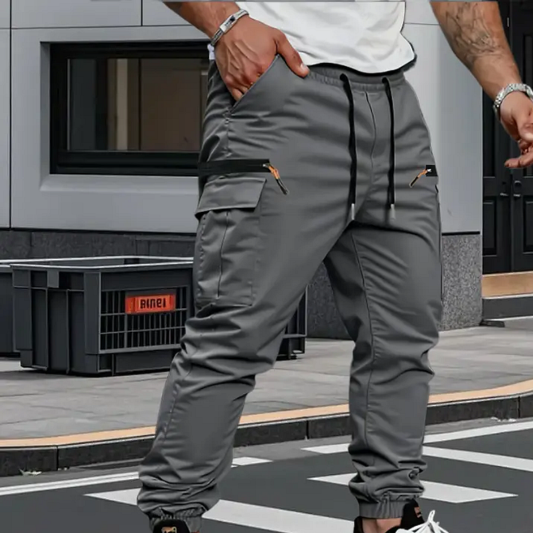 Stylish men's cargo pants, perfect for casual wear, featuring a drawstring waist and multiple functional pockets.