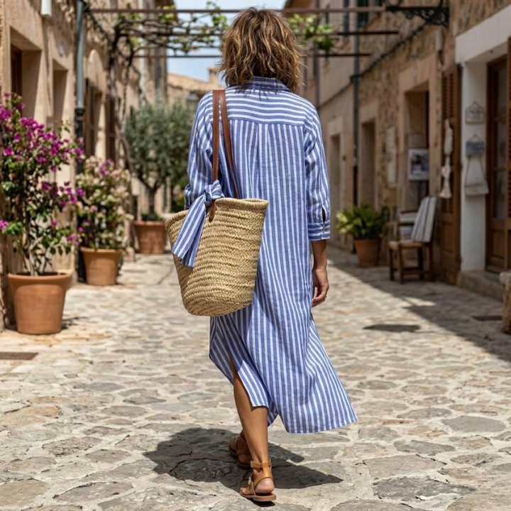Effortless striped shirt dress, button-down design for women. Relaxed fit, perfect for elegant casual summer.