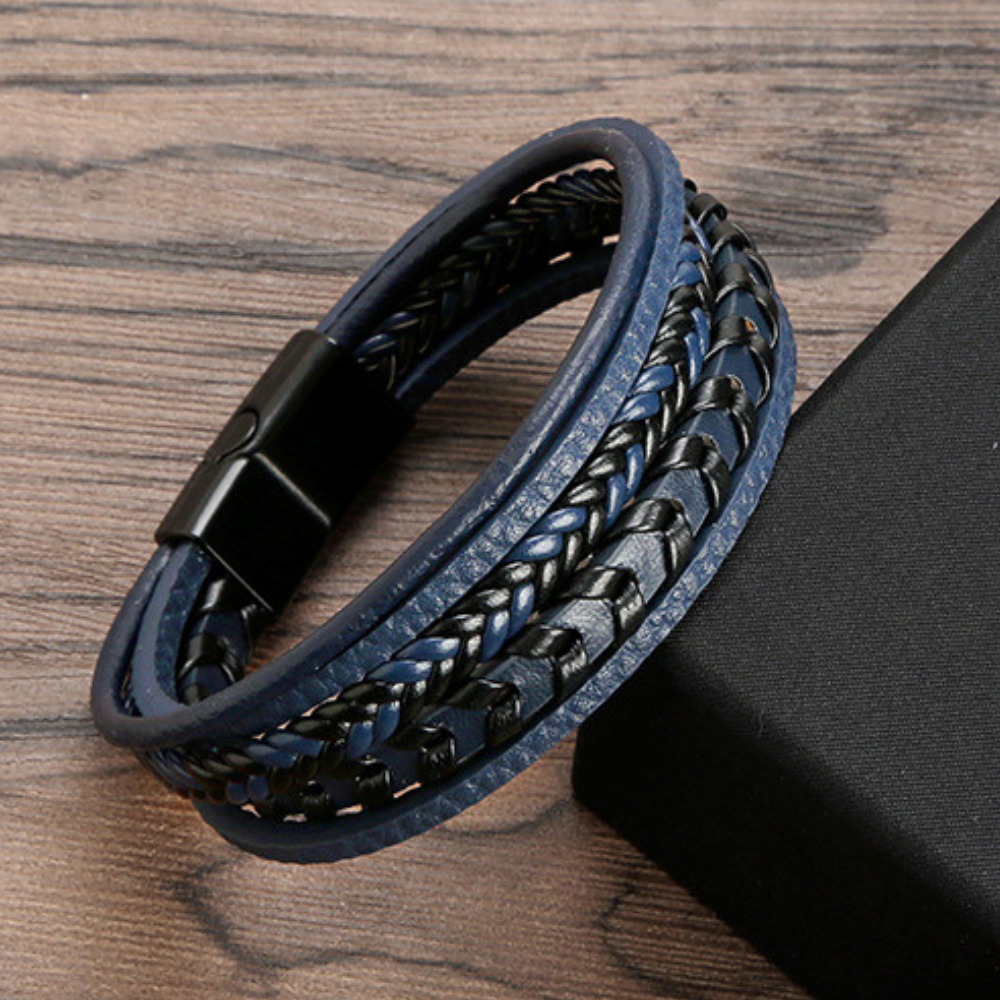 Men's braided leather bracelet featuring a secure magnetic clasp & Viking aesthetic.