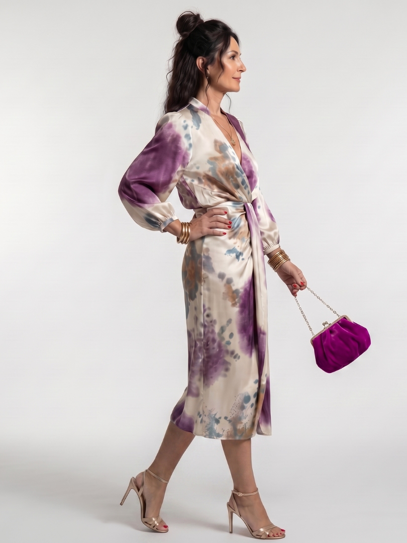 Stylish women's printed long sleeve midi dress, featuring a flattering cross wrap design and tie waist.