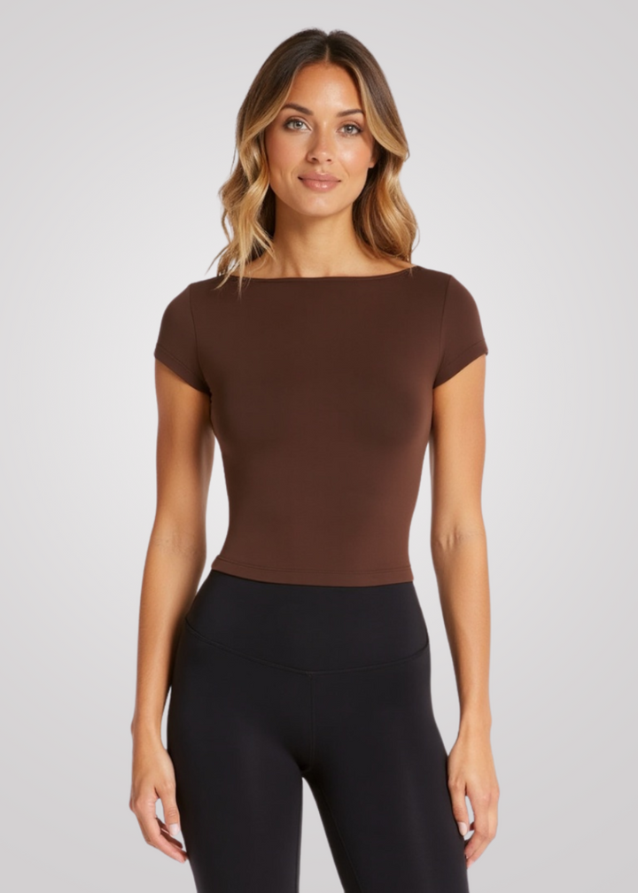 Stylish women's workout t-shirt with light support built-in bra, perfect for fitness & comfort.