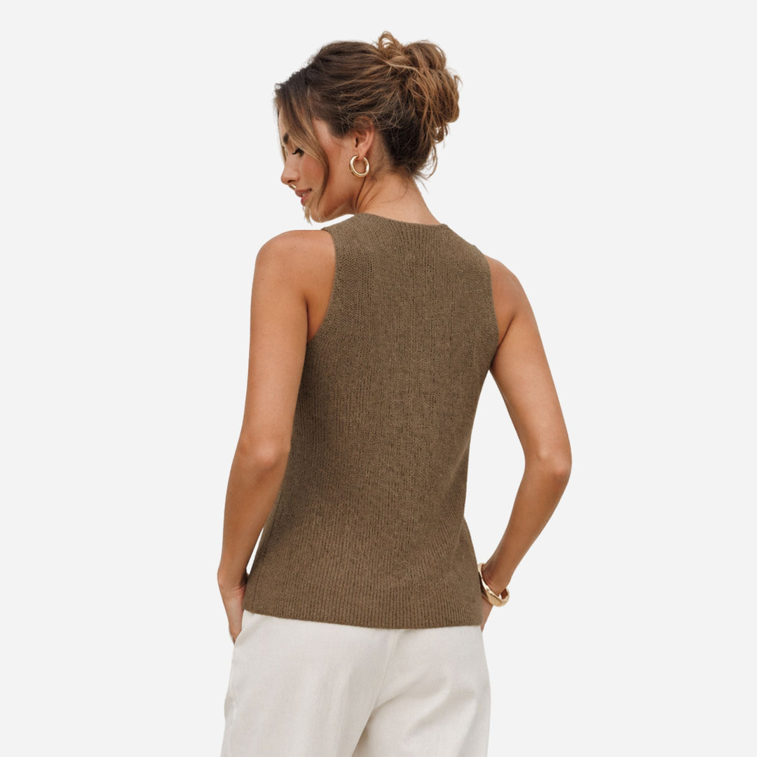 Sleeveless women's fitted cross halter tank top in white, ideal for versatile smart casual outfits.