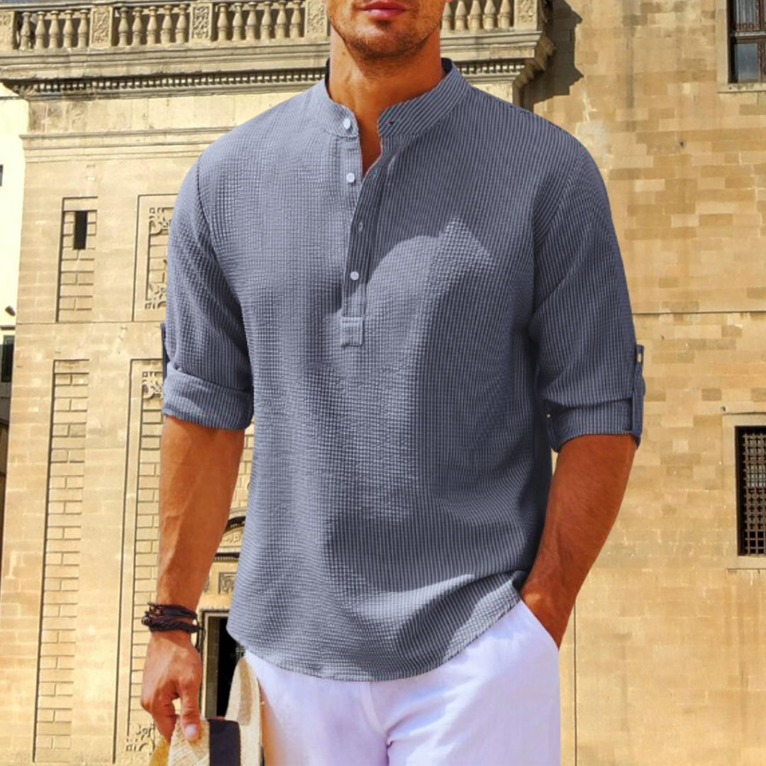 Sophisticated men's up collar casual shirt. Long sleeve and versatile for modern men's fashion.