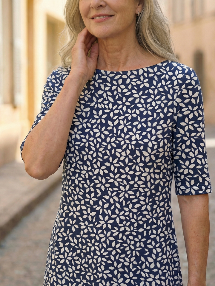 Effortless blue coastal pattern midi dress for women with three-quarter sleeves, ideal for casual summer fashion.