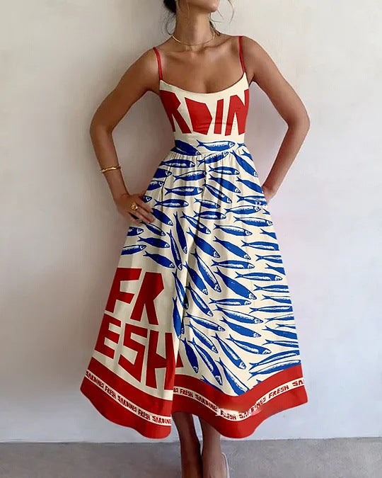 Women's coastal art print midi dress, flowing summer style. Sleeveless vacation beachwear, flattering for special occasions.