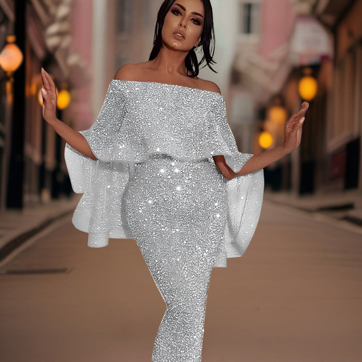 Close-up of the delicate ruffles & off-shoulder neckline on this elegant women's party dress.